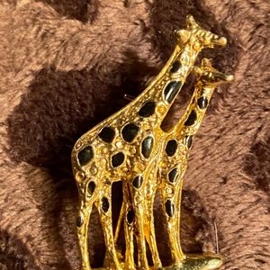 Vintage gold double giraffe enameled brooch pin